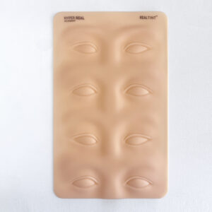 Hyper Real Academy RealTint silicone practice pad with four eye sets for PMU eyeliner and brow training demonstration.