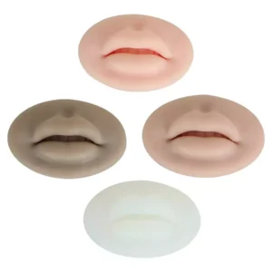 Four silicone lip practice pads in varying skin tones for PMU lip blush training and demonstration.
