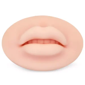 Silicone practice mouth for lip blush training. Realistic PMU training pad for permanent makeup demonstration.
