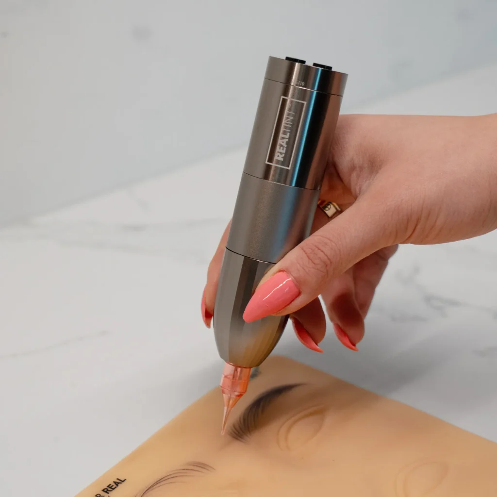 Hyper Real Academy RealTint Nova PMU machine demonstration for nano brows and hair strokes training.