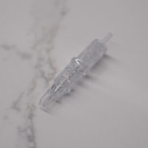Hyper Real Academy SMP needle cartridge. Clear PMU tool for scalp micropigmentation training and demonstration.