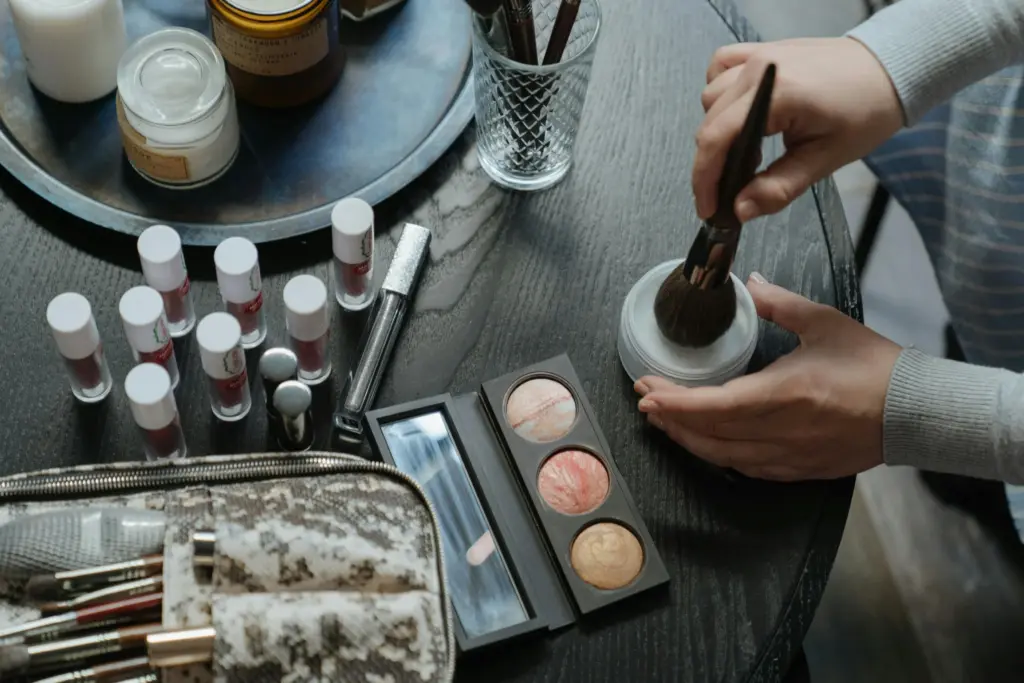 PMU training demonstration with RealTint lip blush, brushes, and powder for nano brows and SMP techniques.
