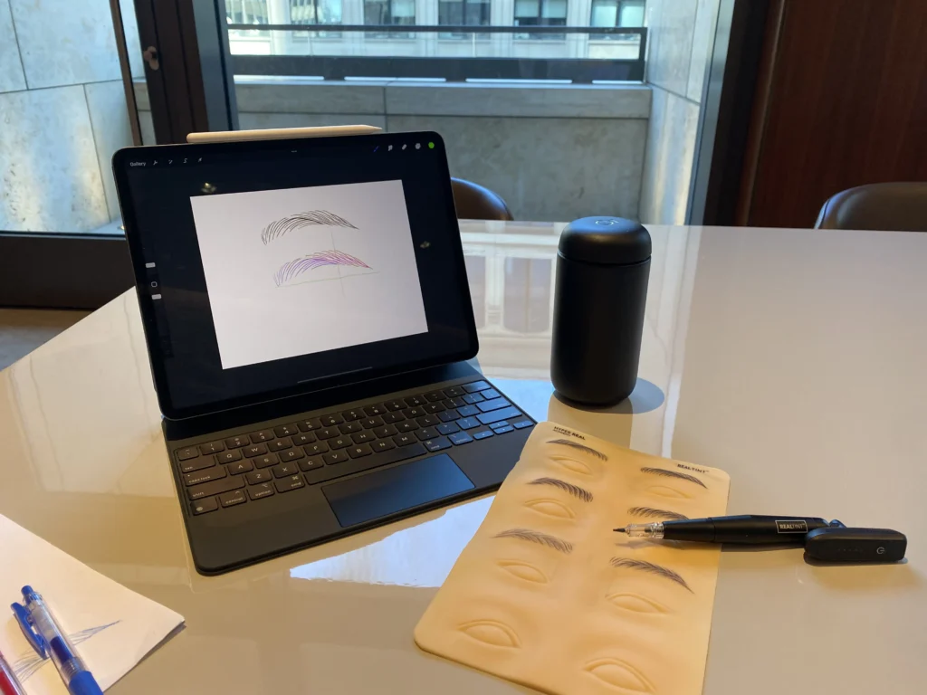 Hyper Real Academy PMU training: iPad eyebrow mapping and RealTint nano brows practice pad demonstration.