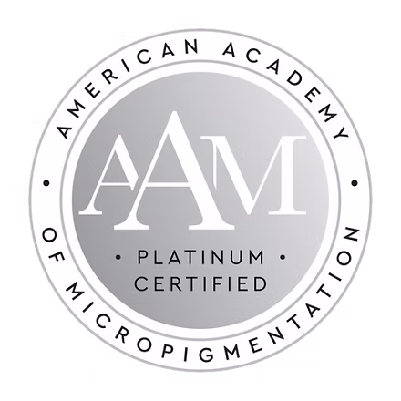 Silver circular Platinum Certified badge for the American Academy of Micropigmentation (AAM). This certification logo signifies advanced professional training in PMU procedures including nano brows, powder brows, lip blush, SMP, and eyeliner, often associated with high-end techniques like RealTint® and Hyper Real Academy standards.