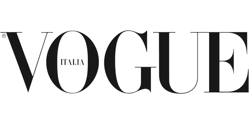 Vogue Uomo logo. 'UOMO' in large sans-serif outline font with 'VOGUE' underneath. Black and white minimalist design. Branding for Italian men's fashion magazine.
